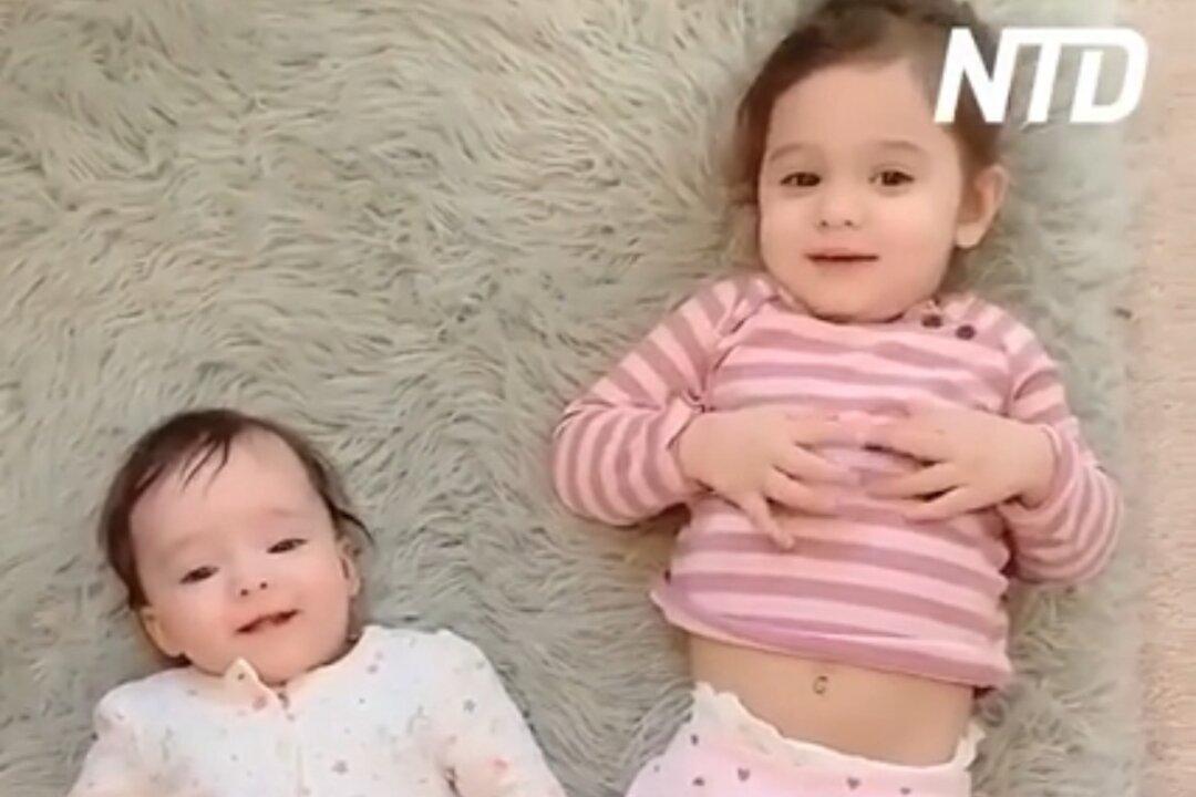 Little Girl Tells Baby Sister She Loves Her, Poses for Pictures