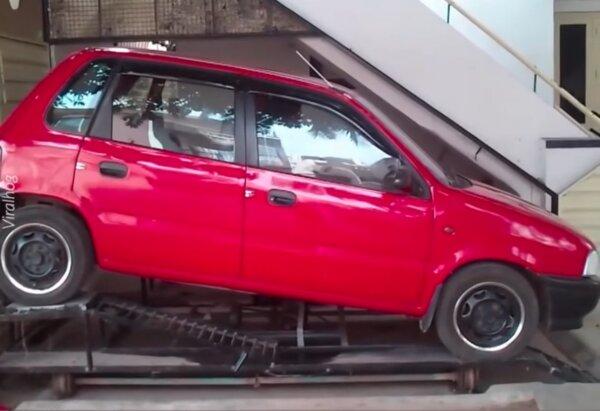 Man Builds Unique Parking Garage Under Stairs